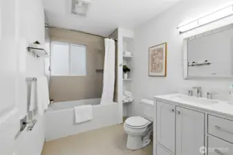 Lower level bathroom with tub/shower combo.