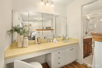 Vanity area looking toward the private 3/4 bath with shower.