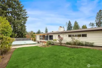 Fully-fenced back yard with so many possibilities.