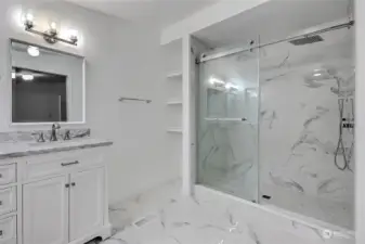 New BEAUTIFULLY designed marble and glass door shower