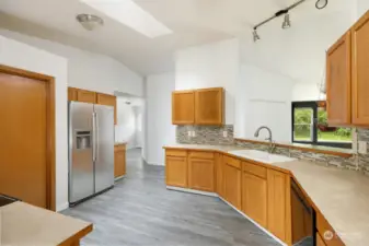 Kitchen with pass through towards living room