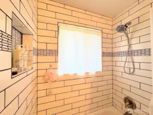 main floor tiled shower