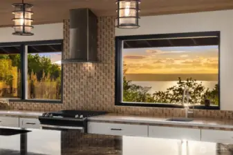 The kitchen windows flow into the view and layered outside living spaces.