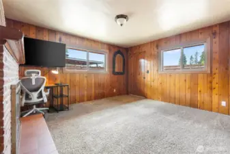 Beautiful Wood paneling in 3rd bedroom that has a private entrance would also make a great office space, game room or second living area.