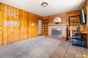 Brick fireplace and gorgeous woodwork in 3rd Bedroom