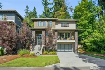 Modern sophistication meets timeless design in this stunning 5-bedroom, 4-bath Northwest contemporary nestled in the desirable Holmes Point / Denny Park community.