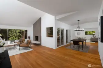 VIEW OF BOTH LIVING ROOM AND DINING AREA FROM ENTRY