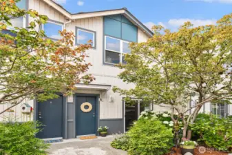 Welcoming entry to this charming townhome