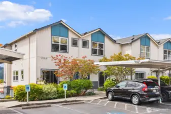 Covered parking space right outside your door plus covered guest parking