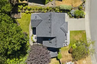 On this quarter acre lot, with mature landscaping and a babbling creek, there is plenty of space for all your outdoor activities.