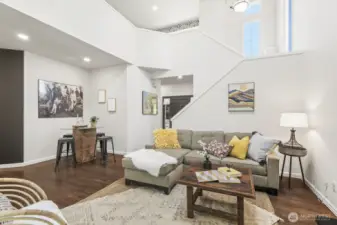 The vaulted ceilings and plethora of windows makes the living room and eating nook feel breezy and open.