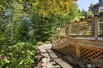 Lush landscaping, stone walkways plus a spot to garden means you will want to spend all your time outdoors.  Peonies, hostas, hydrangeas, herbs, strawberries, blueberries, raspberries are just a few of the amazing year after year plants here.