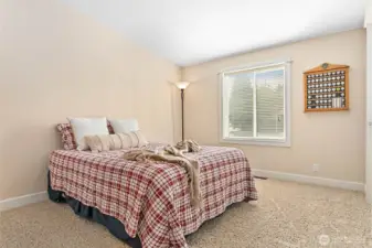 1 of 2 identically sized bdrms on other end of home-both with walk-in closets
