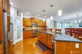 Designed with intention, this has all of the working triangles for great meals to be made, and the countertop space to host well.