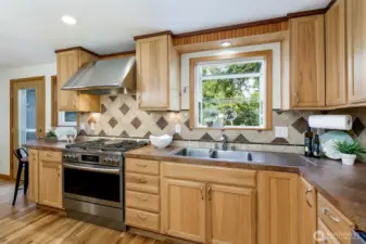 Hickory Huntwood cabinets; new Frigidaire 6 burner gas range & oversized hood