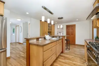 Unique 2-tier island makes cooking & entertaining simple. Enjoy these beautiful hardwood floors in almost all rooms in home.