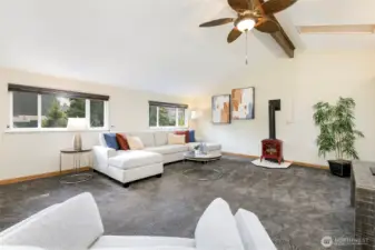 Spacious bonus room has plenty of room for multiple functions; thermostat-controlled gas fireplace adds charm & coziness to your time here