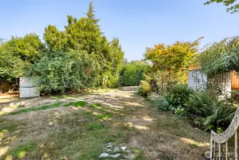 Backyard size could provide ADU/DADU options or unique privacy for this close-in home option