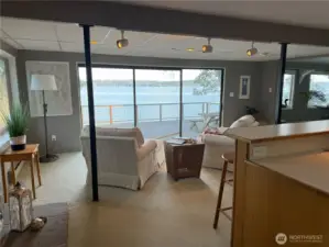 View from the entry way into the living room and kitchen.