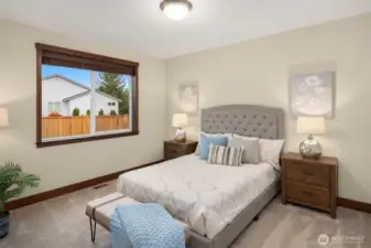 One of two bedrooms located on the side of the home