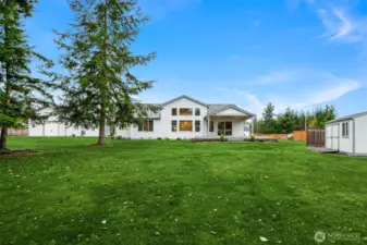 The backyard is nearly an acre