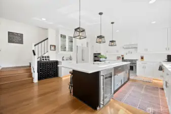 Wine or beverage fridge. Coffee or cocktail bar. Storage on BOTH sides of this enormous island.