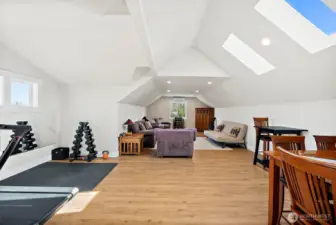 This is just extra! Extra bonus space above the garage. Separate entrance and staircase will bring you up to your new game room, gym, office.  So many possibilities!