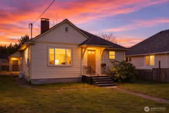 What a cutie! A cheerful soft yellow exterior, classic Craftsman details, and newer cement board siding come together to create a welcoming and refreshed first impression. Welcome Home!