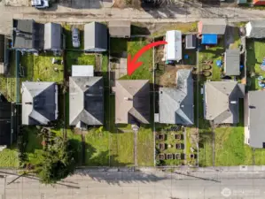 A classic city lot that checks all the boxes, featuring a fully fenced backyard with room to relax or garden, convenient alley access, a petite garage, and easy off-street parking tucked neatly behind the home.