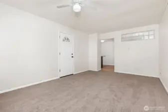 Family Looking Toward Kitchen Doorway