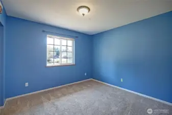 Den that was used as a bedroom.