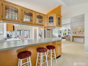 Bar seating and eating space in kitchen.