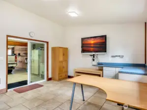 Office or possible, additional living space in the back of the detached shop. Buyer to verify.