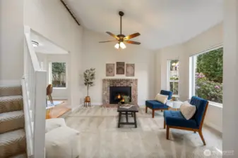 From the entry looking into the living room with gas fireplace replaced in 2024