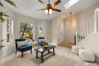 The home offers both hardwood floors and carpet installed in 2023