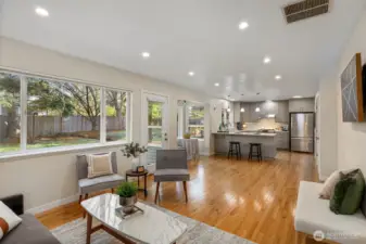 Gleaming hardwood floors throughout the kitchen, breakfast nook, and den or family room
