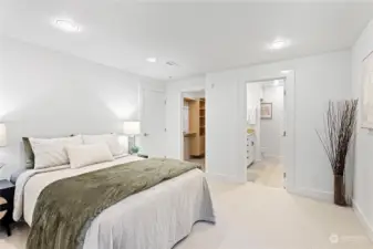 Spacious primary suite with walk-in closet & 5 piece bath