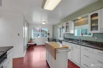 This darling kitchen has been tastefully updated.