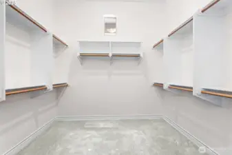 Primary walk-in closet-Upper