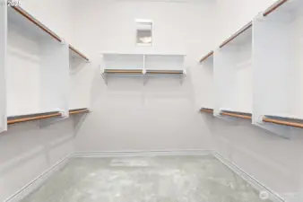 Primary walk-in closet-Upper