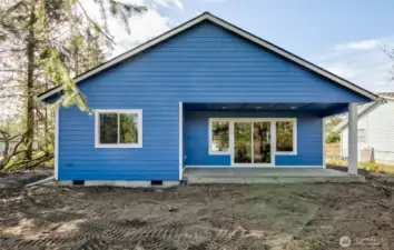 Covered back porch and large yard