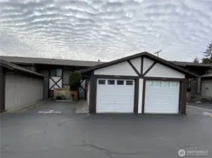 Welcome to this wonderful condo! Garage #202 belongs to this unit for your own car, sheltered from our rainy weather.