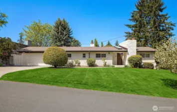 The large and level lot features incredible privacy.