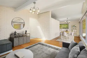Virtual Staging of the open living room and dining room spaces. There's so much spacious room!!