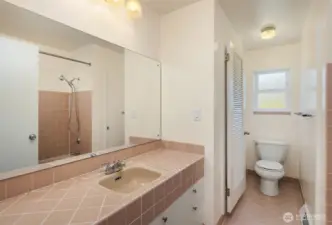 Original tile in excellent condition makes this second bathroom timeless in its appeal.