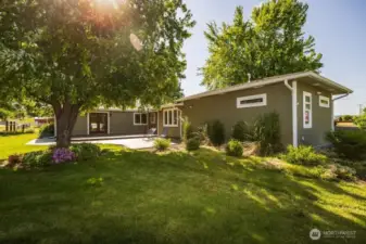 back of home showing deck & patio space