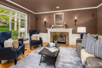 The views from this room are simply stunning, looking out over the front yard.  Mature plantings block out all signs of the street, offering you complete privacy in this home.