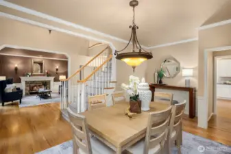 The flow of this home is open and inviting, featuring large entry ways and elegant touches with wainscotting, crown molding, wood floors and beautiful trim work throughout.  A relaxed elegance - perfection!