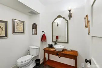 1/2 Bath off hallway, convenient for Guests or Bathroom needs.