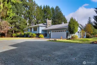 Two car attached garage and ample driveway parking.